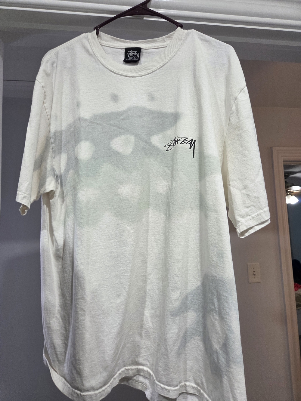 Stussy White Short-Sleeve Graphic Tee with Small Chest Logo